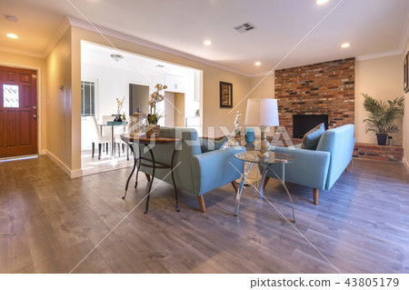Living room with double couches toward kitchen 43805179