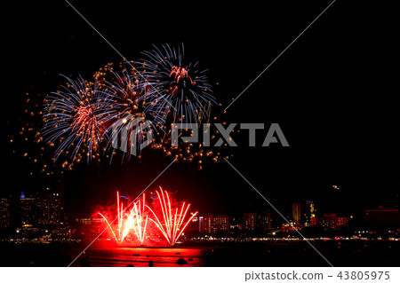 Many flashing fireworks with night cityscape background celebrat 43805975