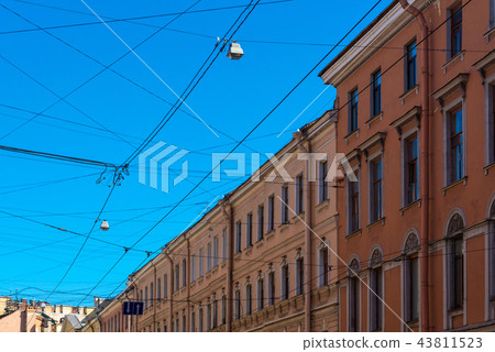Electrical wires and cables over urban downtown 43811523