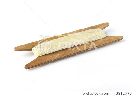 Wooden coil with nylon cord Wooden coil with nylon cord 43811776