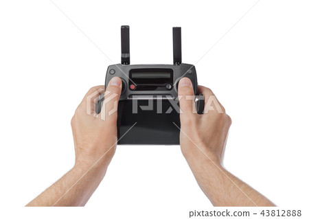 Radio remote control in hands 43812888