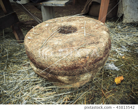 The ancient quern stone hand mill.  43813542