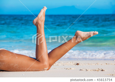 Tanned woman in bikini Tanned woman in bikini 43813754