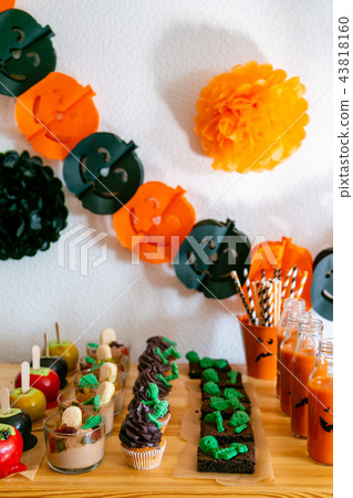 Halloween style party candy bar and decorations 43818160