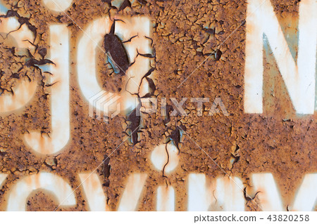 Dark Rusted Metal Texture Background with Letters Dark Rusted Metal Texture Background with Letters 43820258