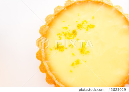 One single lemon tart, isolated on white. 43823029