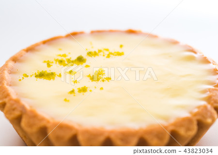 One single lemon tart, isolated on white. 43823034