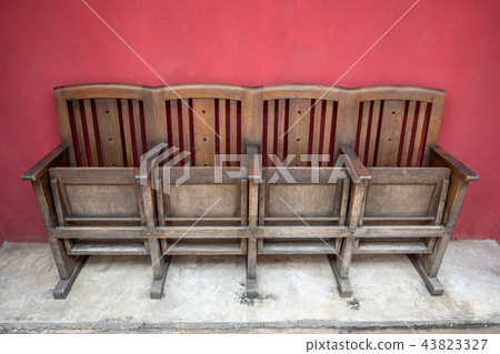 Ancient wooden chair for watching movies Ancient wooden chair for watching movies 43823327