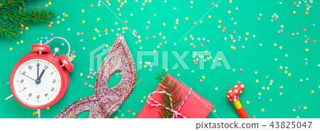 Christmas pattern flat lay with red alarm clock Christmas pattern flat lay with red alarm clock 43825047