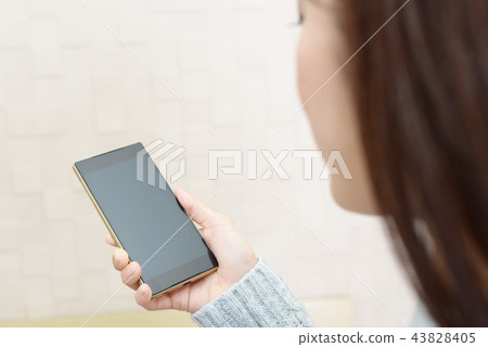 Woman with smartphone Woman with smartphone 43828405