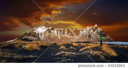 Vestrahorn mountains with dramatic sky with clouds, Iceland Vestrahorn mountains with dramatic sky with clouds, Iceland 43828863