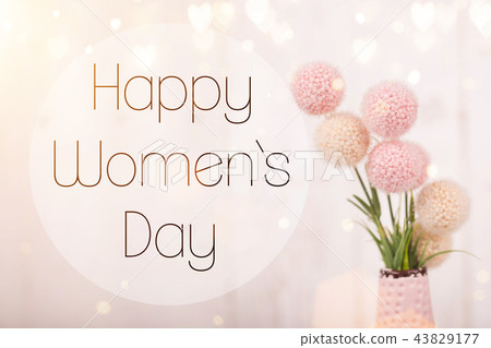 Flowers composition for Women's Day. Pink flowers on old white wooden background. 43829177