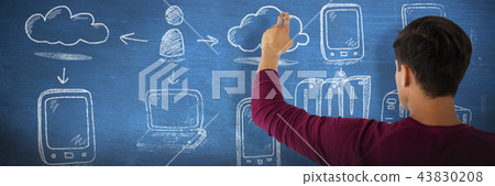 Composite image of rear view of businessman touching invisible imaginary screen 43830208