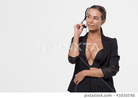 Lady with deep neckline and head microphone 43830598