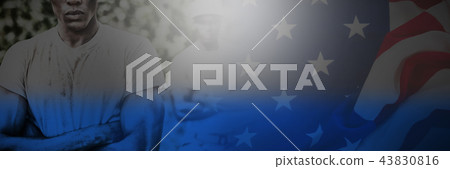 Composite image of american flag on a wooden table 43830816