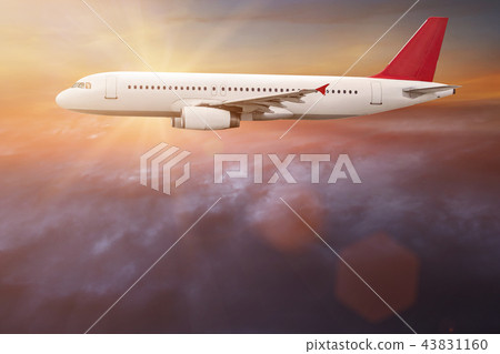 Commercial airplane flying above clouds. Commercial airplane flying above clouds. 43831160