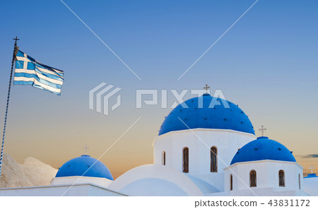Classic view of blue dome church in Santorini. 43831172