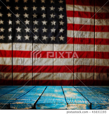 Empty wooden table over vintage USA flag background. Empty wooden table over vintage USA flag background. 43831193
