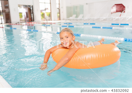 Cute cheerful nice girl smiling to you Cute cheerful nice girl smiling to you 43832092