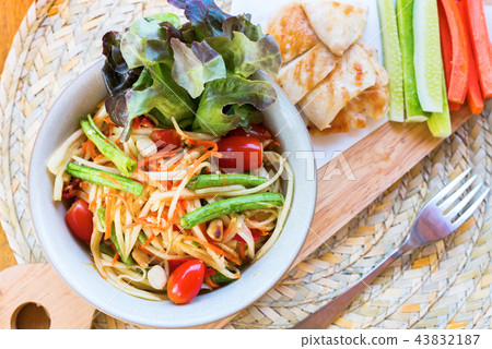 Thai food Papaya salad chicken served vegetables 43832187