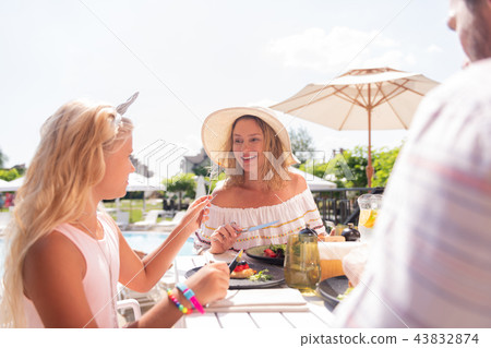 Nice cute young girl holding a fork Nice cute young girl holding a fork 43832874