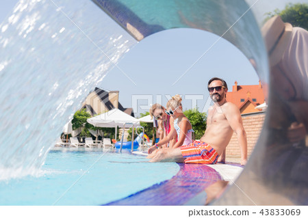 Happy nice family having a vacation together Happy nice family having a vacation together 43833069