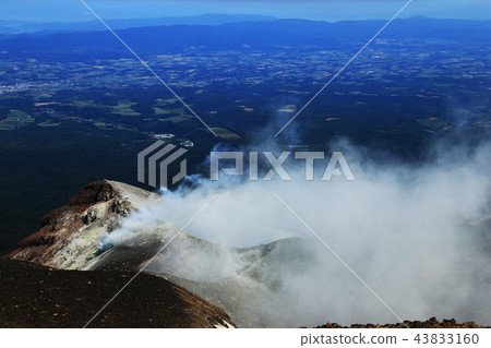 The town of Furano over Tokachidake plume The town of Furano over Tokachidake plume 43833160