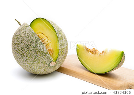 melon on cutting board isolated on white melon on cutting board isolated on white 43834306