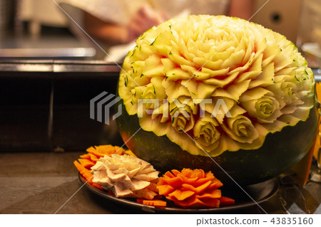 Thai Hand carved watermelon In Flower pattern. 43835160