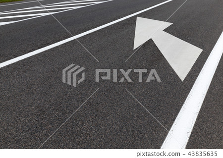 asphalted road with arrows 43835635