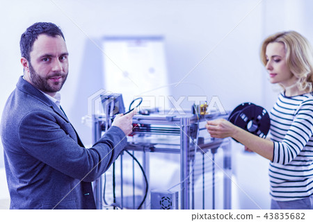 Handsome brunette man turning his head to camera Handsome brunette man turning his head to camera 43835682