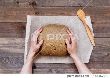 The piece of fresh dough for gingerbread The piece of fresh dough for gingerbread 43836228