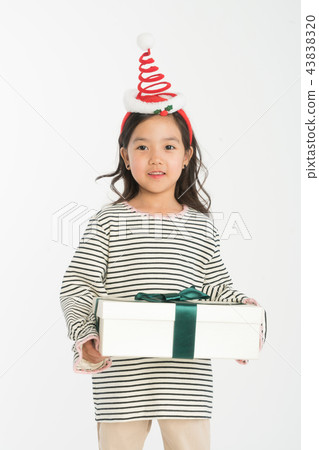 Girl child standing on white background Girl child standing on white background 43838320