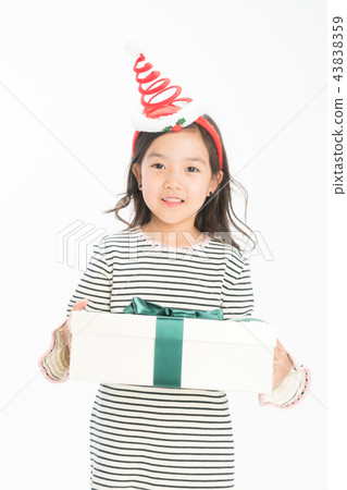 Girl child standing on white background Girl child standing on white background 43838359