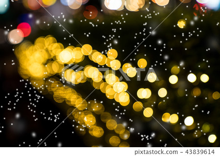Colorful orange bokeh with snow background Colorful orange bokeh with snow background 43839614