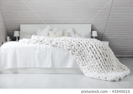 White nordic bedroom interior with knit plaid White nordic bedroom interior with knit plaid 43840028