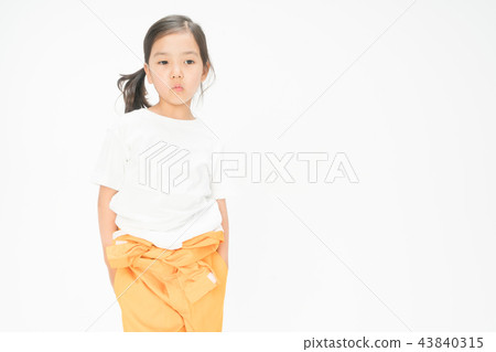 Girl child standing on white background 43840315