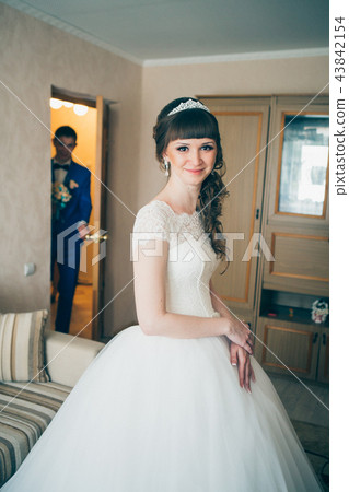 young bride waiting for the groom in house young bride waiting for the groom in house 43842154