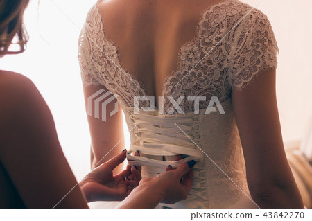 lace wedding dress back of a young bride lace wedding dress back of a young bride 43842270