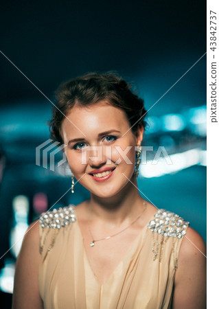 portrait of young girl smiling on a background portrait of young girl smiling on a background 43842737