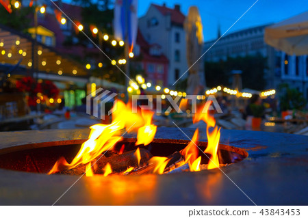 Fire in the stove in the square in Riga Fire in the stove in the square in Riga 43843453