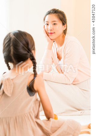 Mother and Child enjoying home baking Mother and Child enjoying home baking 43847120