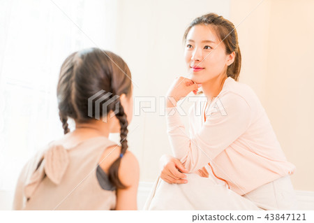 Mother and Child enjoying home baking Mother and Child enjoying home baking 43847121