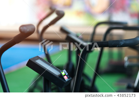 Air bikes for cardio workout in the crossfit gym Air bikes for cardio workout in the crossfit gym 43852173