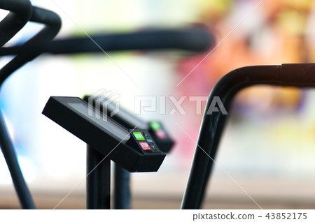 Air bikes for cardio workout in the crossfit gym Air bikes for cardio workout in the crossfit gym 43852175