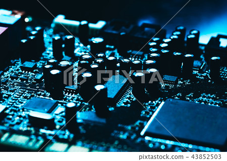 computer motherboard in blue dark background close 43852503