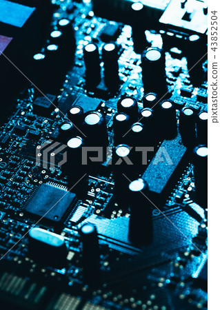 computer motherboard in blue dark background close 43852504