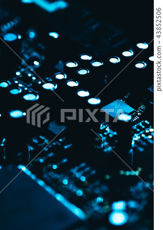 computer motherboard in blue dark background close 43852506