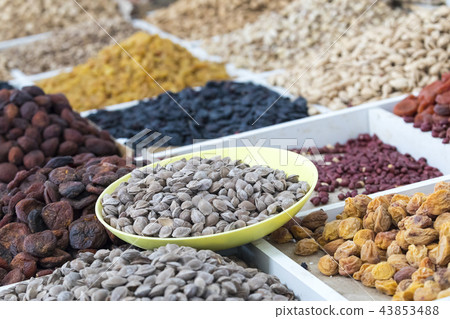 Dried fruits and nuts on local food market Dried fruits and nuts on local food market 43853488