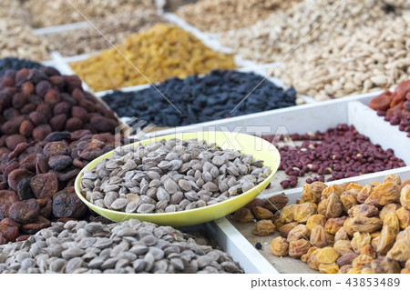 Dried fruits and nuts on local food market Dried fruits and nuts on local food market 43853489